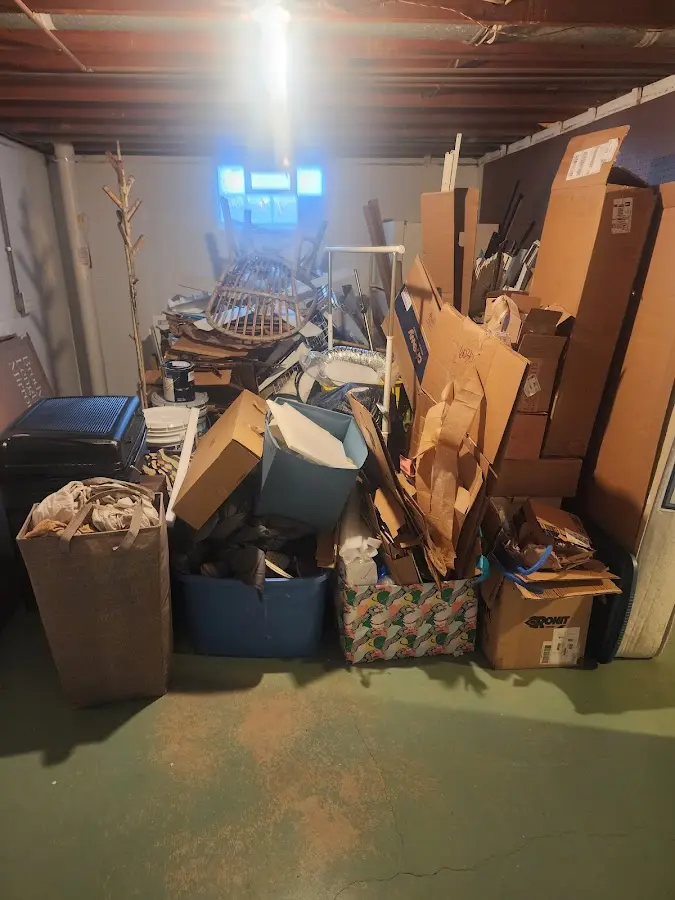 Roll-off dumpster container at job site for 6 Yard Dumpster Rental in Bedford